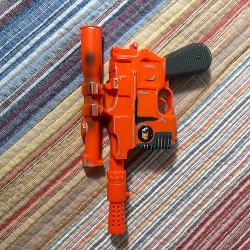 Disney Star Tours Star Wars Han Solo DL-44 Blaster Toy Orange Silver Weathered